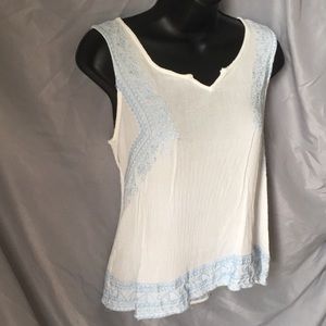 White linen -like blue embroidery top
